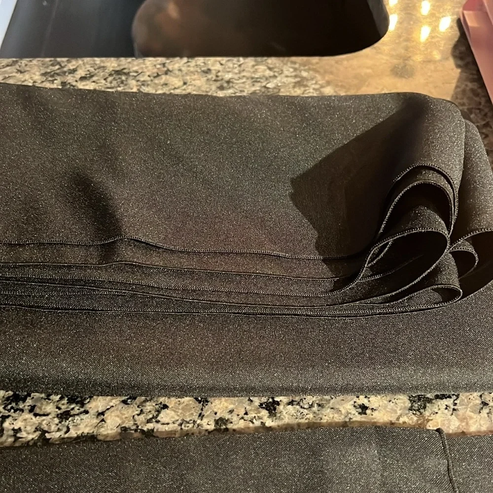 Black cloth table covering 60 by 120